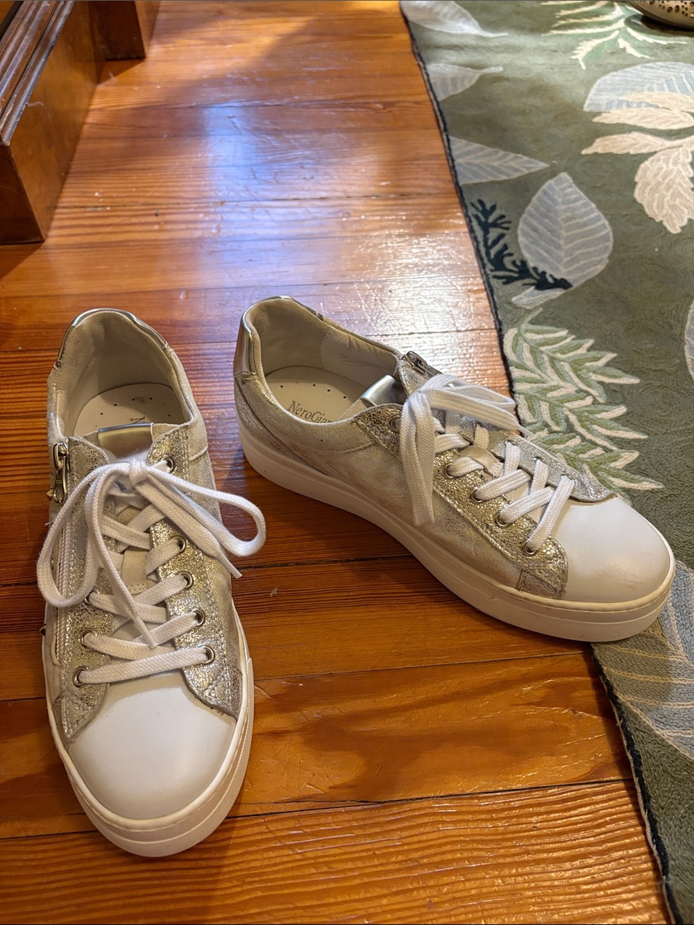 Nero Giardini Women's White Sneakers with Silver Accents and zip closure